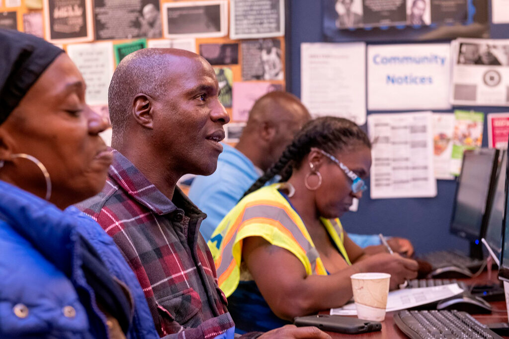 Image: Rubicon participants using computers on-site during a program in 2018. Now, participants can connect to programs online through Zoom and Google Classroom.