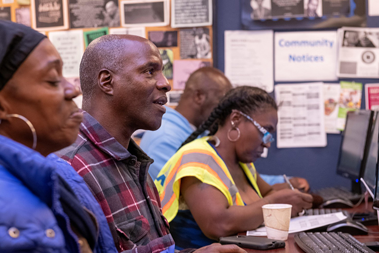 Image: Rubicon participants using computers on-site during a program in 2018. Now, participants can connect to programs online through Zoom and Google Classroom.